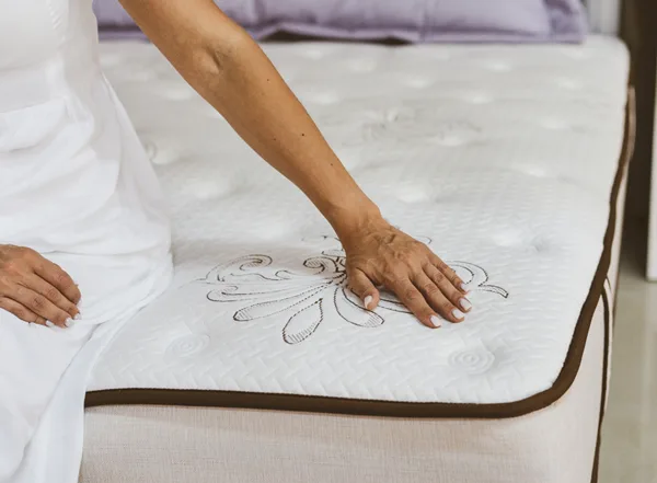 Mattress display in the CostLess Warehouse showroom